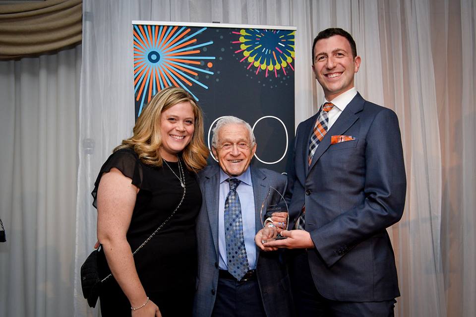 Jack J. Fattal (standing on the right, with Karina and Arthur Roskies) receives the Jon Roskies Award for New Leadership at the 2017 Jewish Leadership Awards.